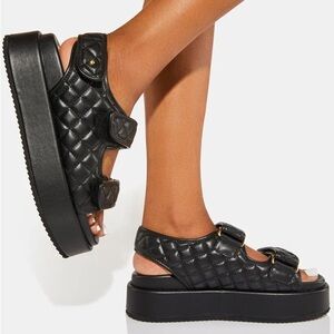 Buffalo Noa Quilt Platform Sandals in Black with Gold Hardware